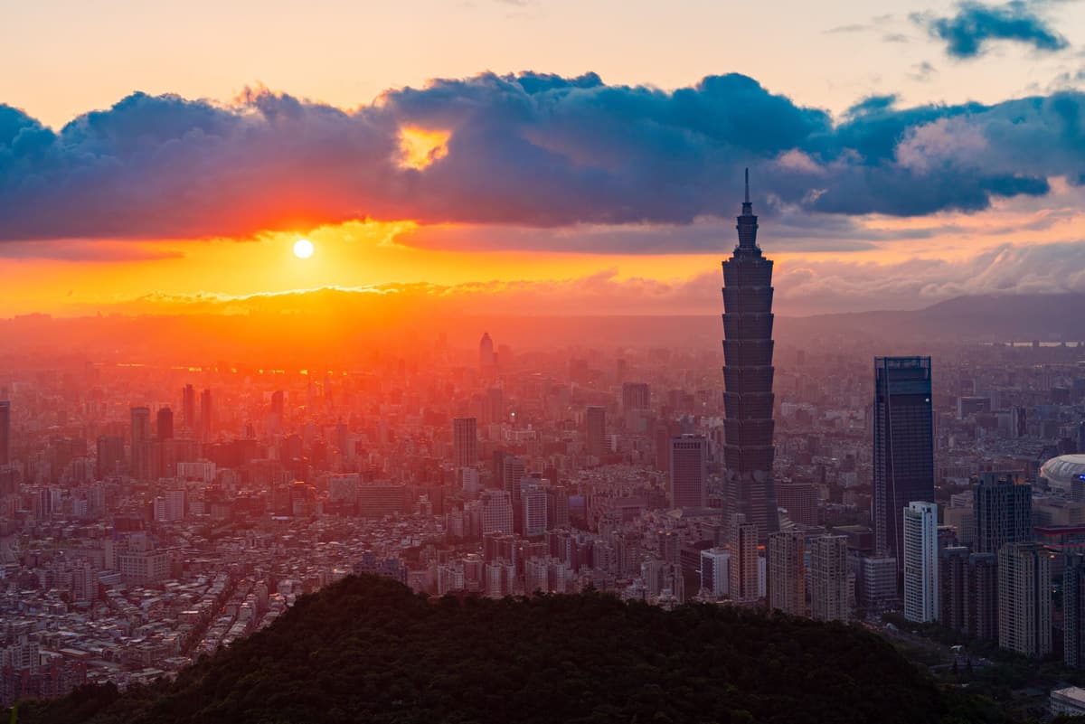 Taipei 101 against a burning sunset sky